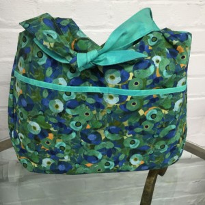 The reverse side of the bag, with two outside pockets.