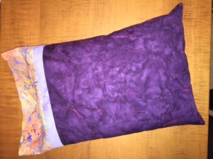 Finished pillowcase with pillow inserted.