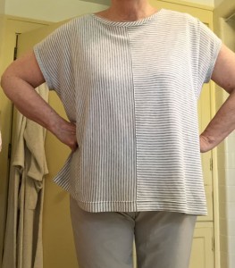 Worn here with a pair of Eileen Fisher stretch crepe crops in "silver." I think the top would go just as well with white.